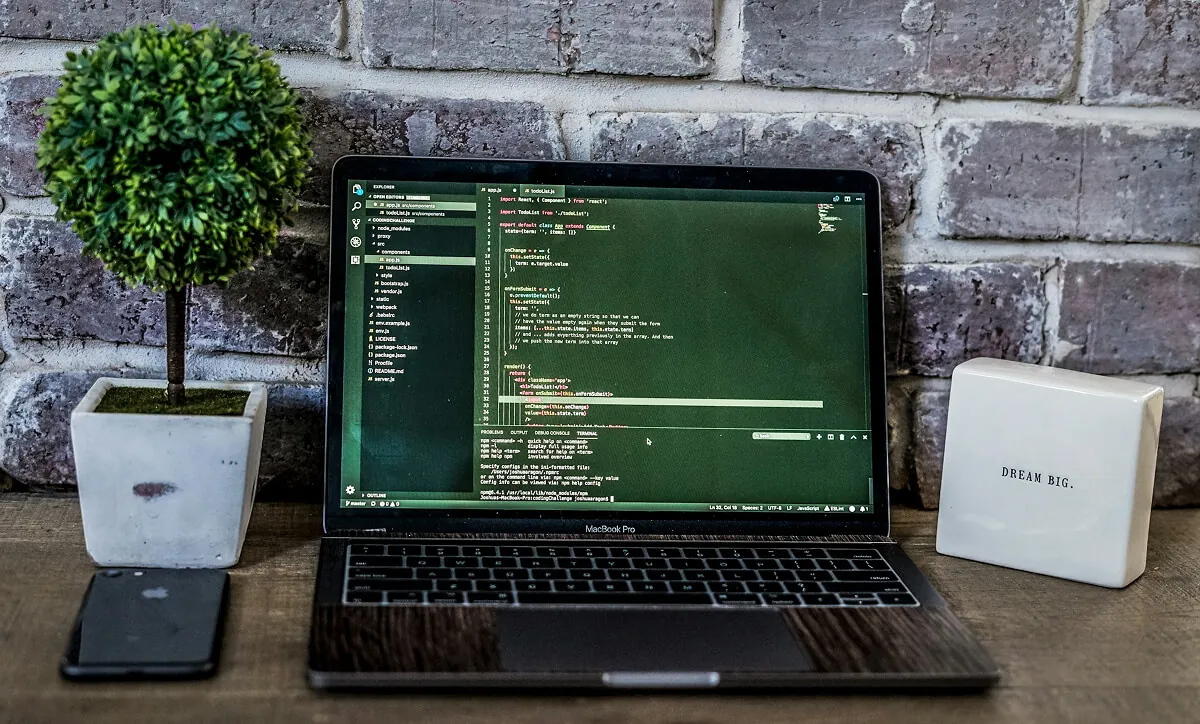 accelerate - ai development agency — developer working on code at desk - Photo by Lukas Blazek on Pexels