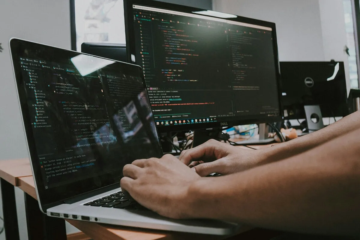 ai mvp development agency — developer working on code at desk - Photo by ThisIsEngineering on Pexels