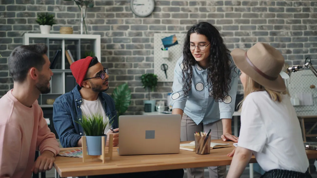 ai powered software development company — team collaborating on whiteboard - Photo by Moe Magners on Pexels