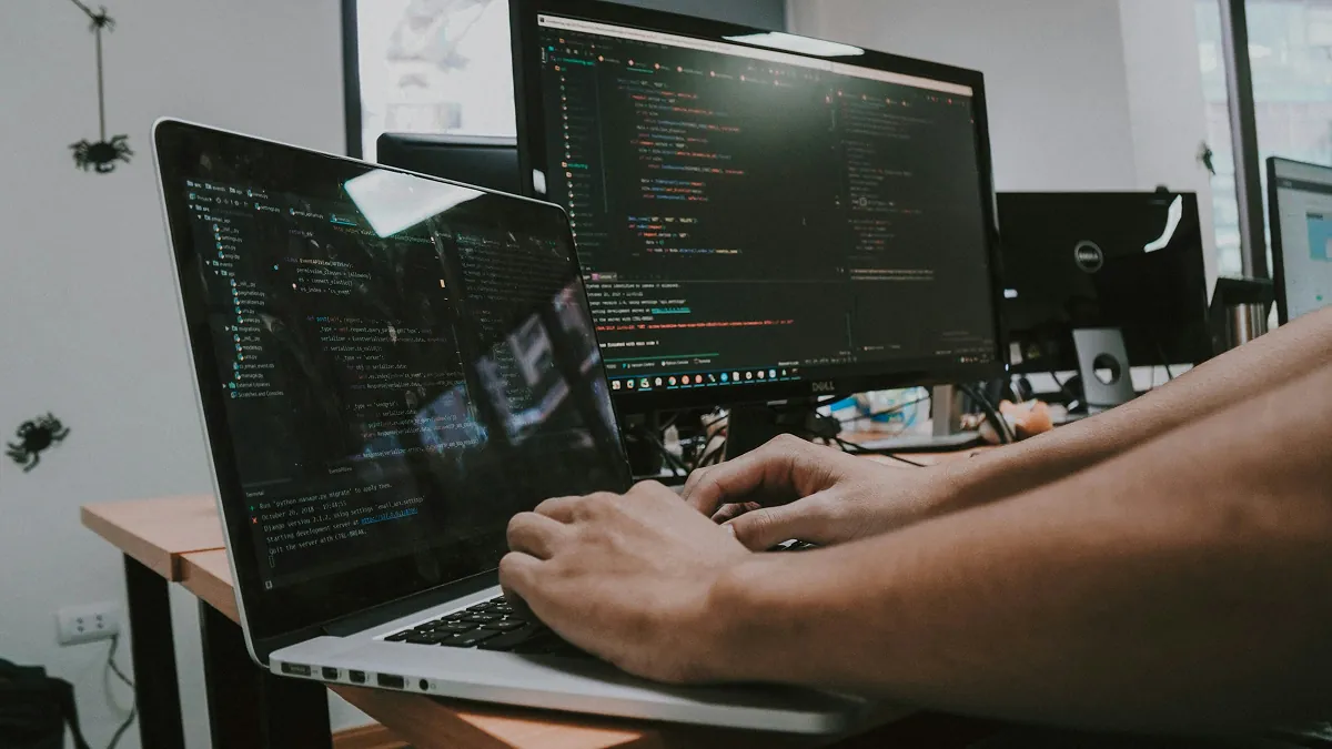 ai powered tools for software development — team collaborating on whiteboard - Photo by Moe Magners on Pexels
