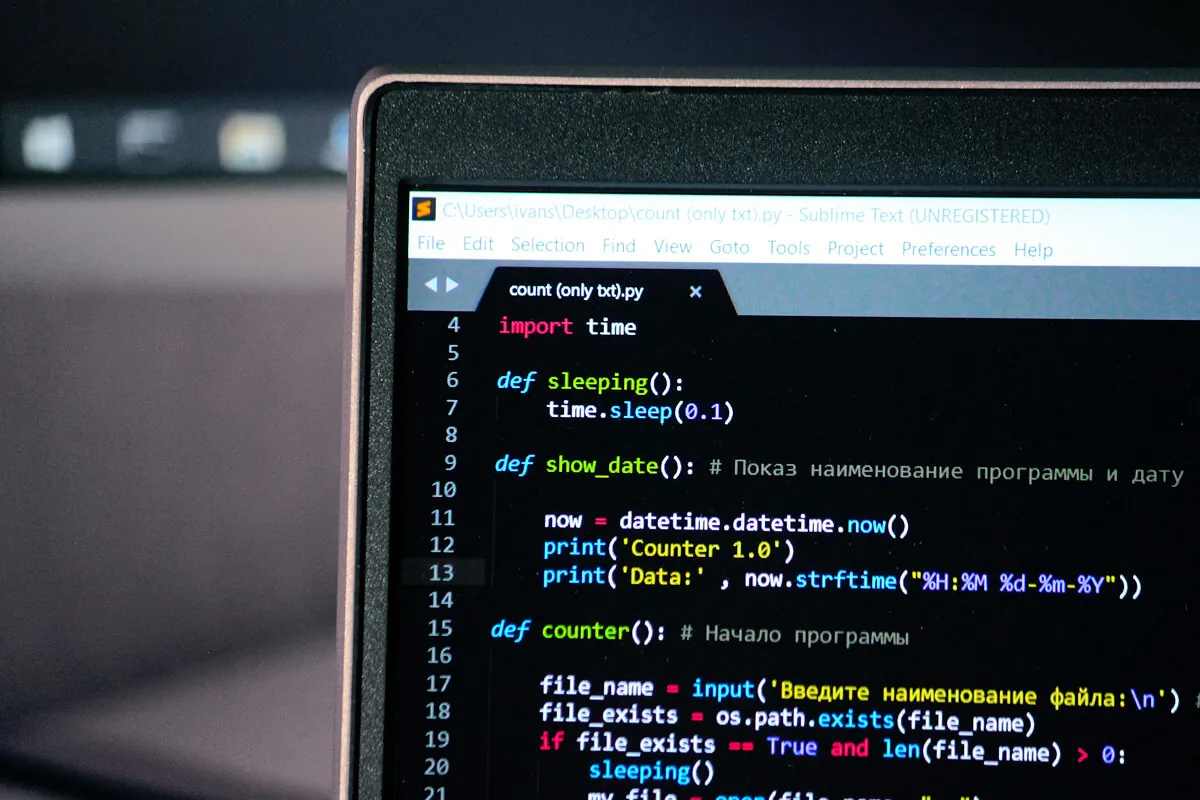Laptop screen showing a Python script open in a code editor